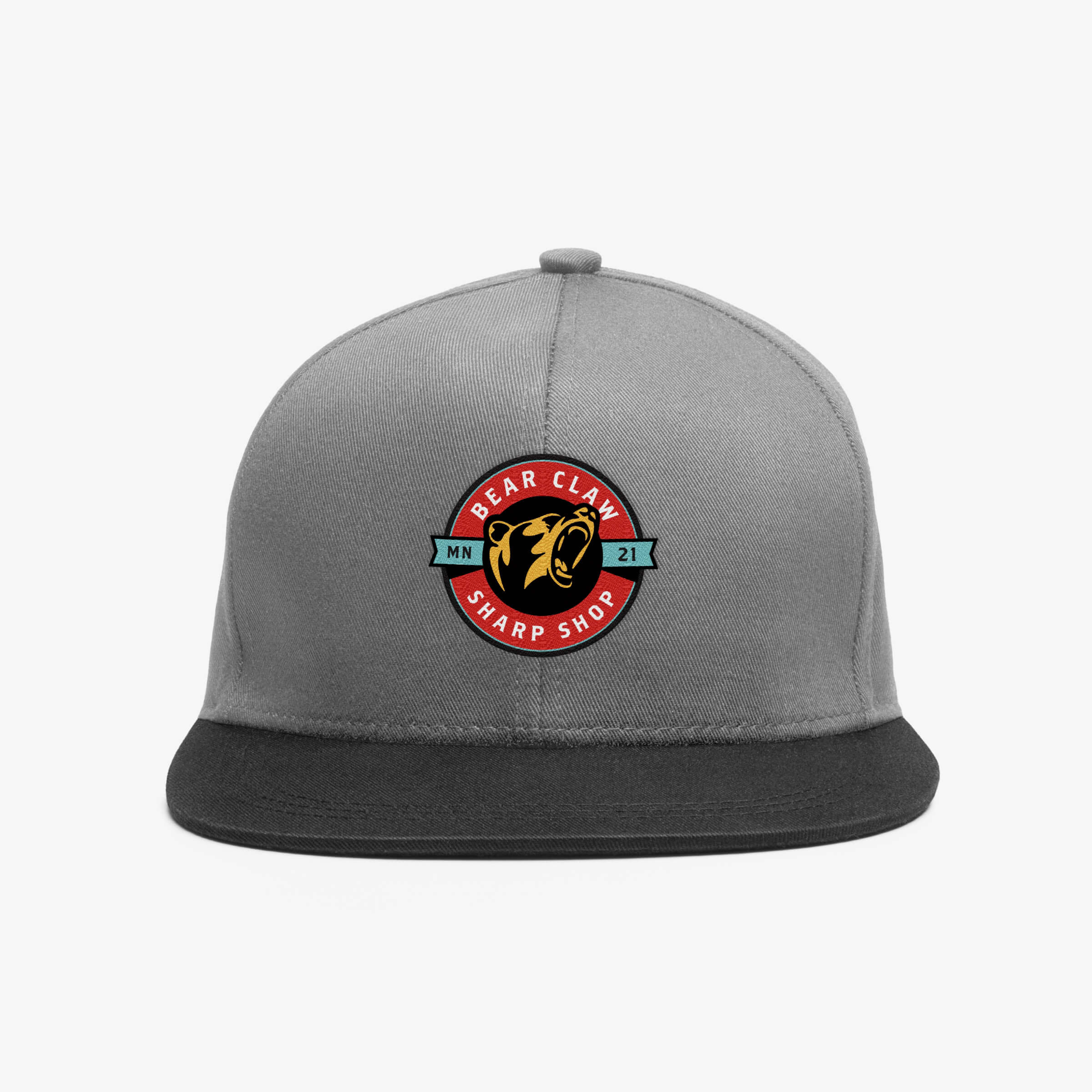 A gray hat with the Bear Claw Sharp Shop logo badge.