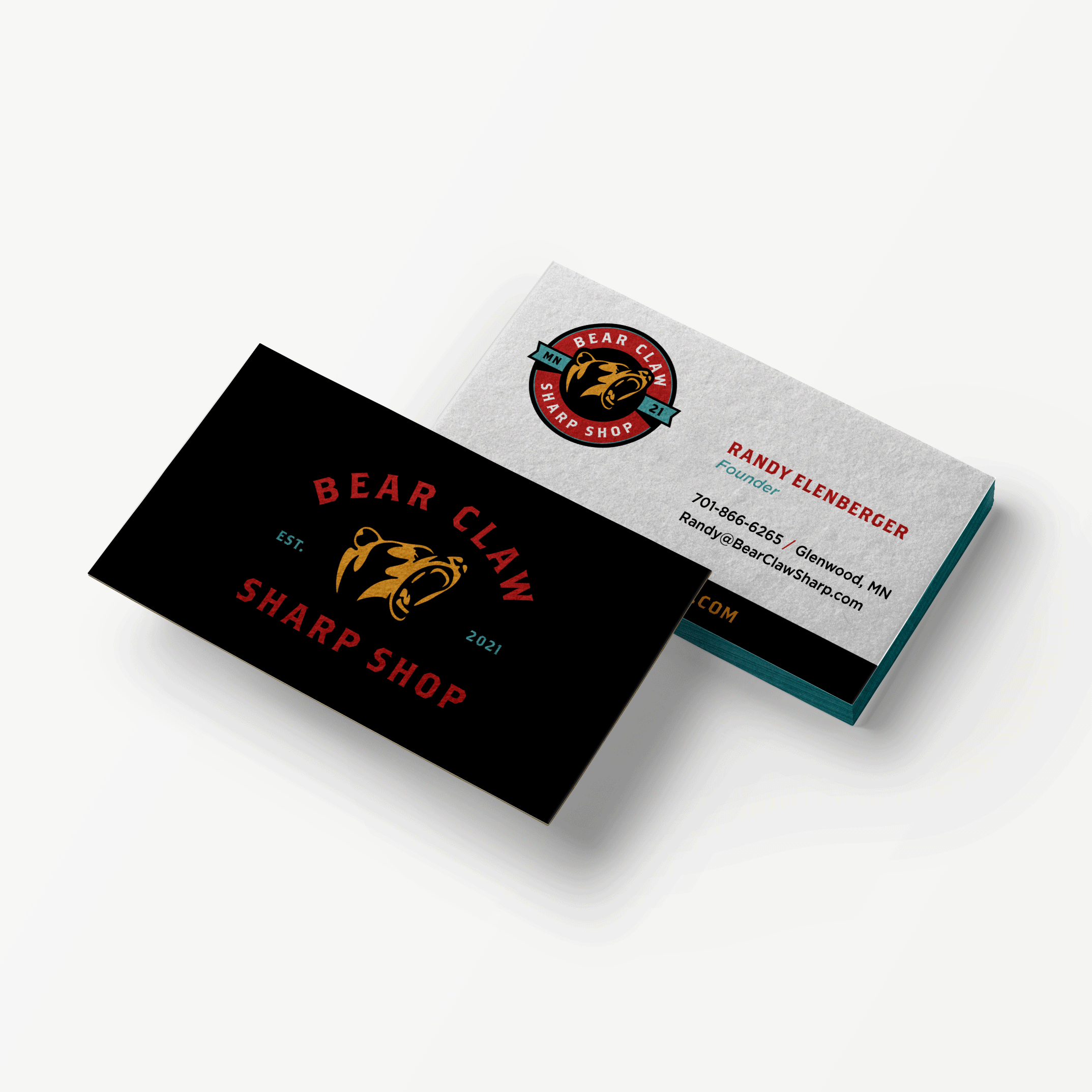Business cards with the Bear Claw Sharp Shop logo and contact information.