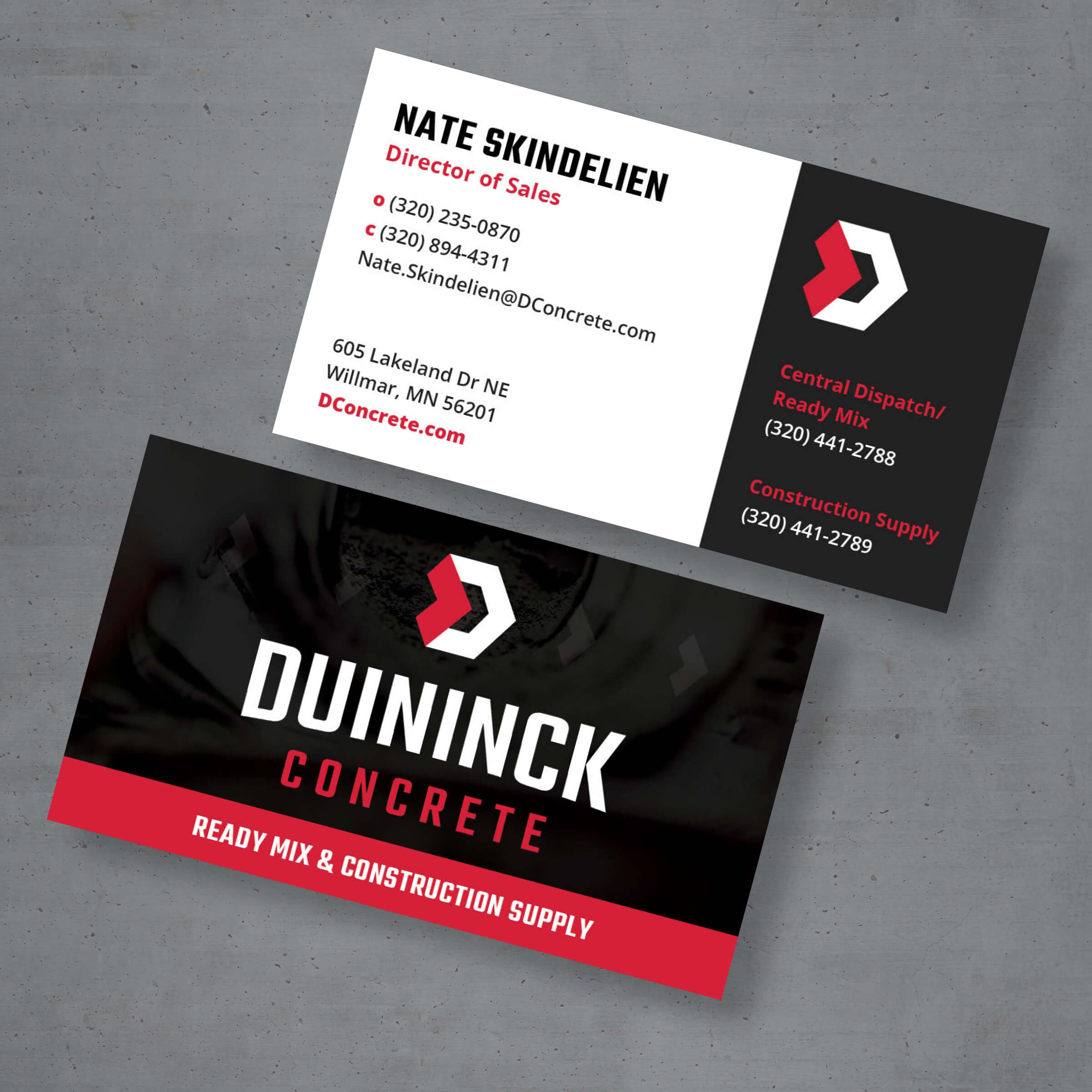 A business card with the Duininck Concrete logo and contact information.