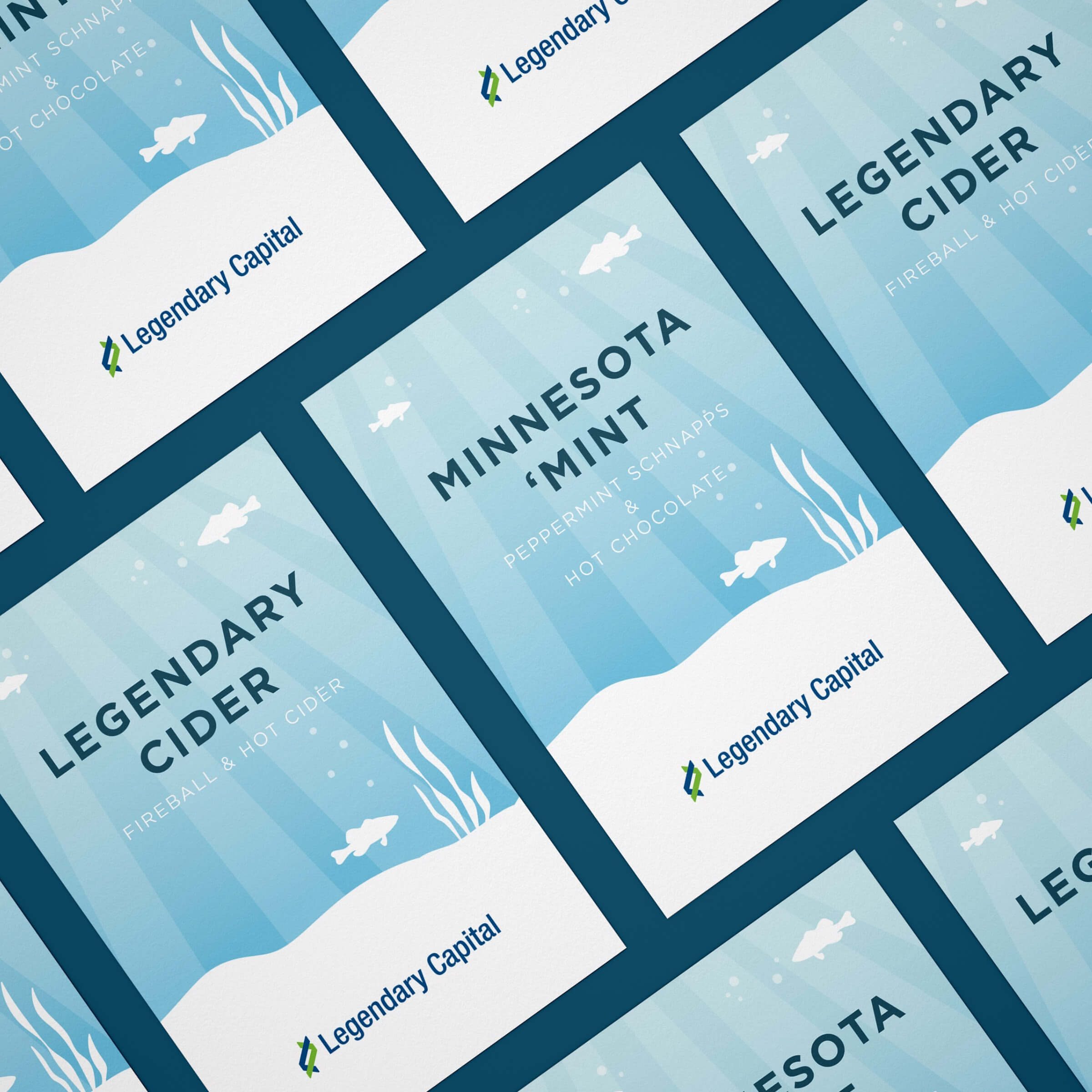 A group of drink labels with a blue and white underwater fish scene.